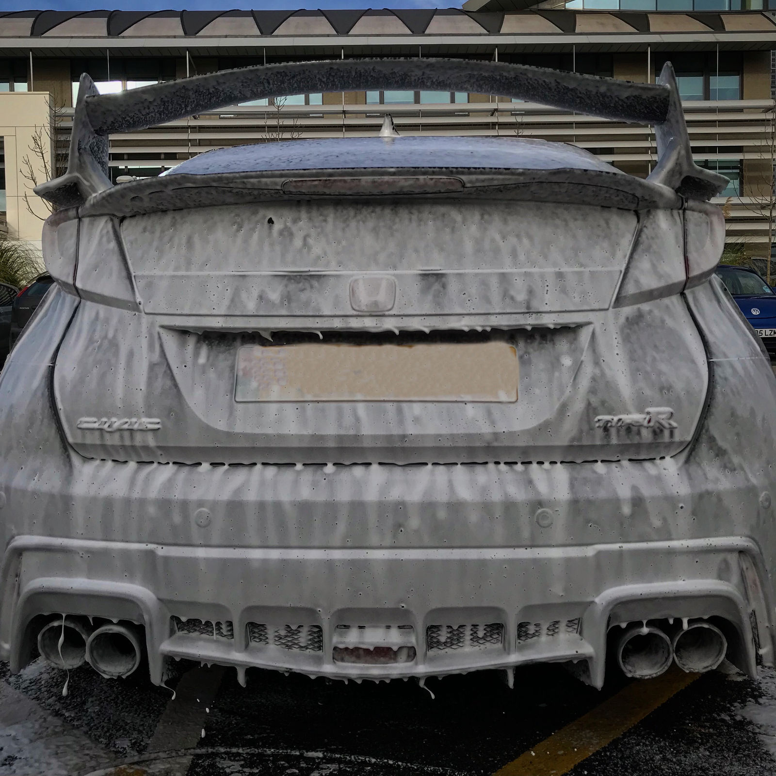 Snow foam being applied during a safe wash